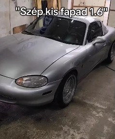 The MX-5 in a workshop, captioned “Szép kis fapad 1.6”